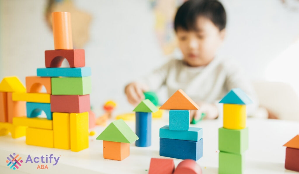a child playing with blocks