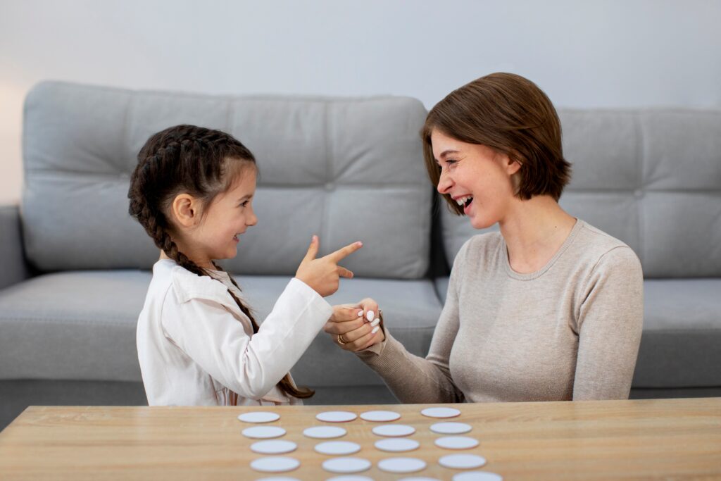 mother girl playing game medium shot 1
