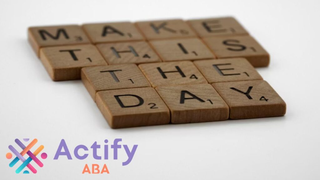 Scrabble tiles spell out the slogan “Make This The Day,” highlighting advocacy for Everyday Is Autism Awareness Day.